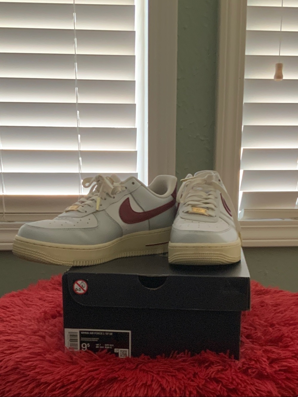 Nike White Leather Sneakers with Maroon Swoosh